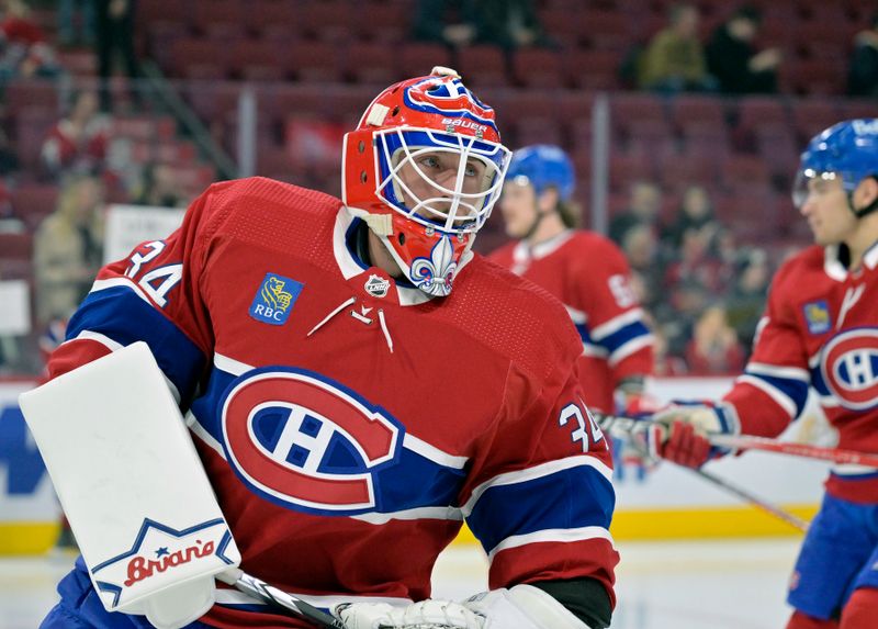 Dec 7, 2023; Montreal, Quebec, CAN; Montreal Canadiens goalie Jake Allen (34) skates during the warmup period before the game against the Los Angeles Kings at the Bell Centre. Mandatory Credit: Eric Bolte-USA TODAY Sports