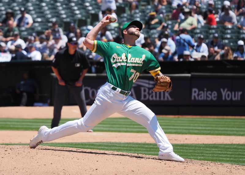 Jun 29, 2023; Oakland, California, USA; Oakland Athletics relief pitcher Lucas Greg (70) pitches the ball against the New York Yankees during the sixth inning at Oakland-Alameda County Coliseum. Mandatory Credit: Kelley L Cox-USA TODAY Sports