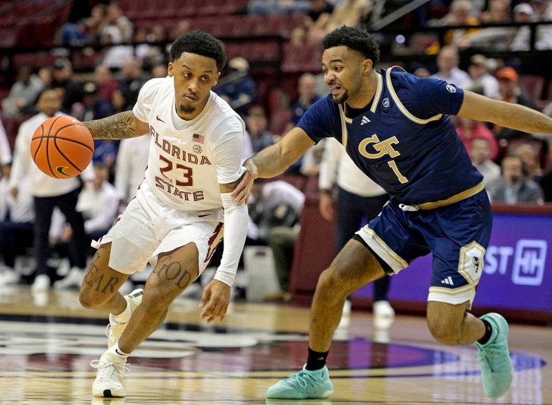 Jan 3, 2024; Tallahassee, Florida, USA; Georgia Tech Yellow Jackets guard Kyle Sturdivant (1) defends Florida State Seminoles guard Primo Spears (23) during the second half at Donald L. Tucker Center. Mandatory Credit: Melina Myers-USA TODAY Sports