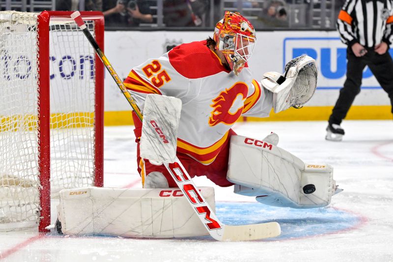 Apr 11, 2024; Los Angeles, California, USA; Calgary Flames goaltender Jacob Markstrom (25) makes a save in the second period against the Los Angeles Kings at Crypto.com Arena. Mandatory Credit: Jayne Kamin-Oncea-USA TODAY Sports