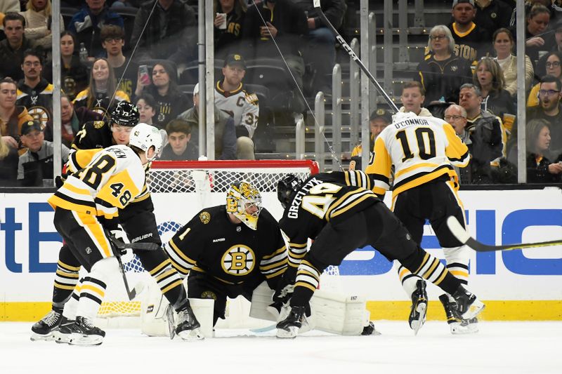 Jan 4, 2024; Boston, Massachusetts, USA; Pittsburgh Penguins left wing Drew O'Connor (10) scores a goal past Boston Bruins goaltender Jeremy Swayman (1) during the first period at TD Garden. Mandatory Credit: Bob DeChiara-USA TODAY Sports