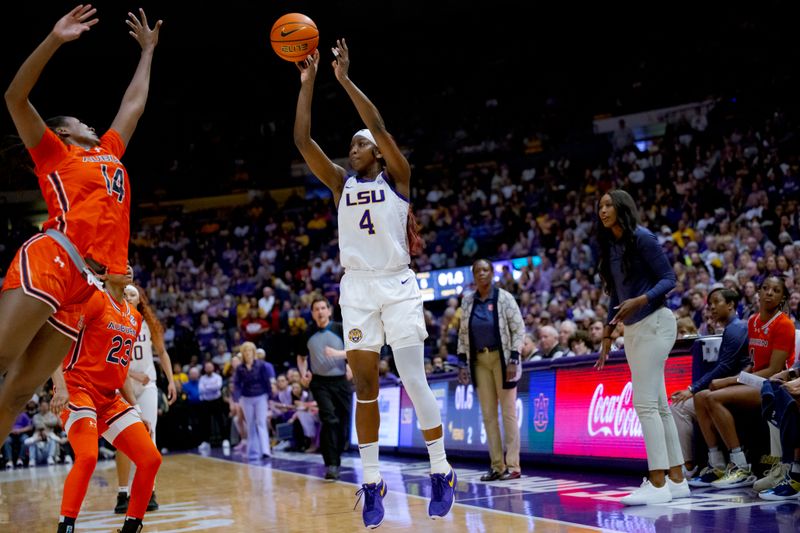 Feb 22, 2024; Baton Rouge, Louisiana, USA;  LSU Lady Tigers guard Flau'jae Johnson (4) makes a three point basket against Auburn Tigers forward Taylen Collins (14) at the buzzer at the end of the second quarter at Pete Maravich Assembly Center. Mandatory Credit: Matthew Hinton-USA TODAY Sports