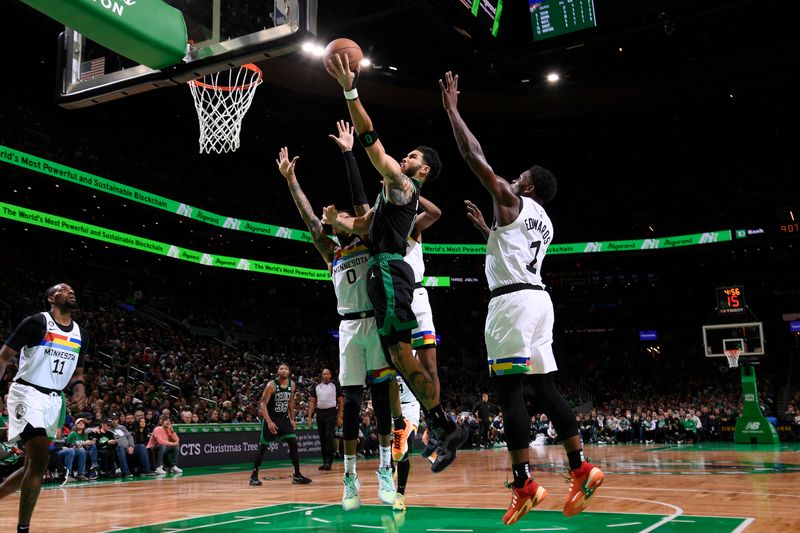 BOSTON, MA - DECEMBER 23: Jayson Tatum #0 of the Boston Celtics drives to the basket during the game against the Minnesota Timberwolves on December 23, 2022 at the TD Garden in Boston, Massachusetts.  NOTE TO USER: User expressly acknowledges and agrees that, by downloading and or using this photograph, User is consenting to the terms and conditions of the Getty Images License Agreement. Mandatory Copyright Notice: Copyright 2022 NBAE  (Photo by Brian Babineau/NBAE via Getty Images)