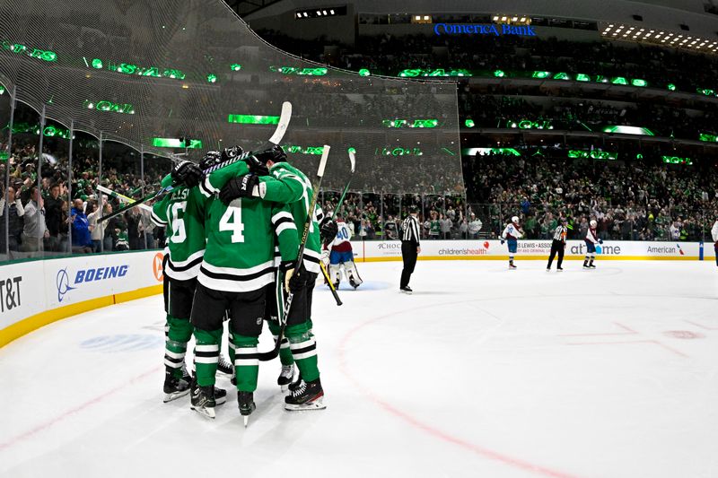 Jan 4, 2024; Dallas, Texas, USA; Dallas Stars defenseman Miro Heiskanen (4) and left wing Jamie Benn (14) and center Roope Hintz (24) and center Joe Pavelski (16) celebrate a power play goal by Pavelski against the Colorado Avalanche during the second period at the American Airlines Center. Mandatory Credit: Jerome Miron-USA TODAY Sports