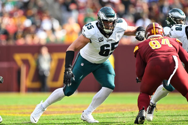 Philadelphia Eagles offensive tackle Lane Johnson (65) in action during the second half of an NFL football game against the Washington Commanders, Sunday, Oct. 29, 2023, in Landover, Md. (AP Photo/Terrance Williams)