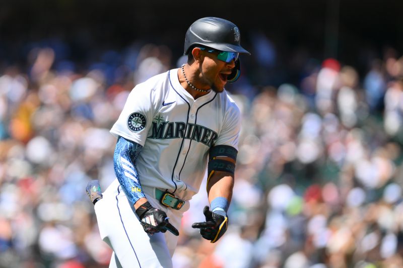 Jul 4, 2024; Seattle, Washington, USA; Seattle Mariners center fielder Julio Rodriguez (44) celebrates hitting a home run against the Baltimore Orioles during the fifth inning at T-Mobile Park. Mandatory Credit: Steven Bisig-USA TODAY Sports