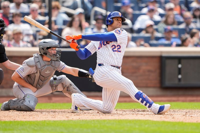 Jun 1, 2025; New York City, New York, USA; New York Mets right fielder Juan Soto (22) hits a home run against the Colorado Rockies during the eighth inning at Citi Field. Mandatory Credit: Gregory Fisher-Imagn Images