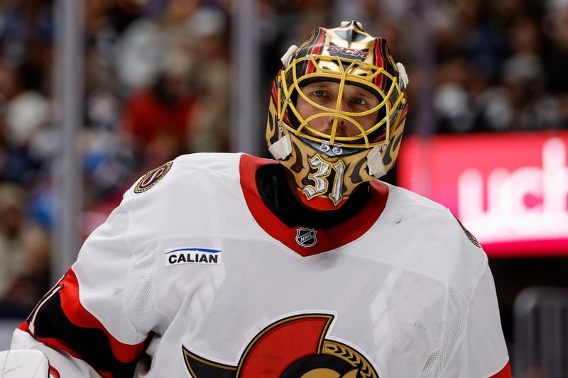 Oct 27, 2024; Denver, Colorado, USA; Ottawa Senators goaltender Anton Forsberg (31) in the second period against the Colorado Avalanche at Ball Arena. Mandatory Credit: Isaiah J. Downing-Imagn Images