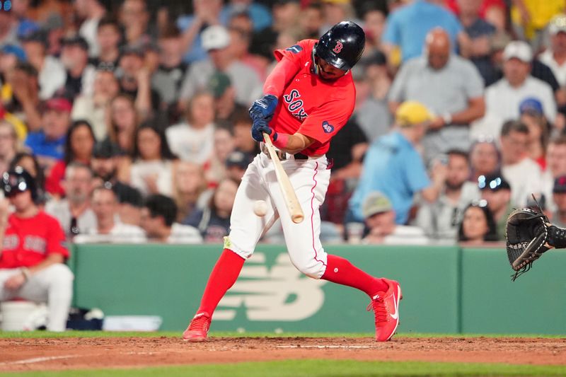 May 24, 2024; Boston, Massachusetts, USA; Boston Red Sox shortstop David Hamilton (70) hits a single against the Milwaukee Brewers during the sixth inning at Fenway Park. Mandatory Credit: Gregory Fisher-USA TODAY Sports