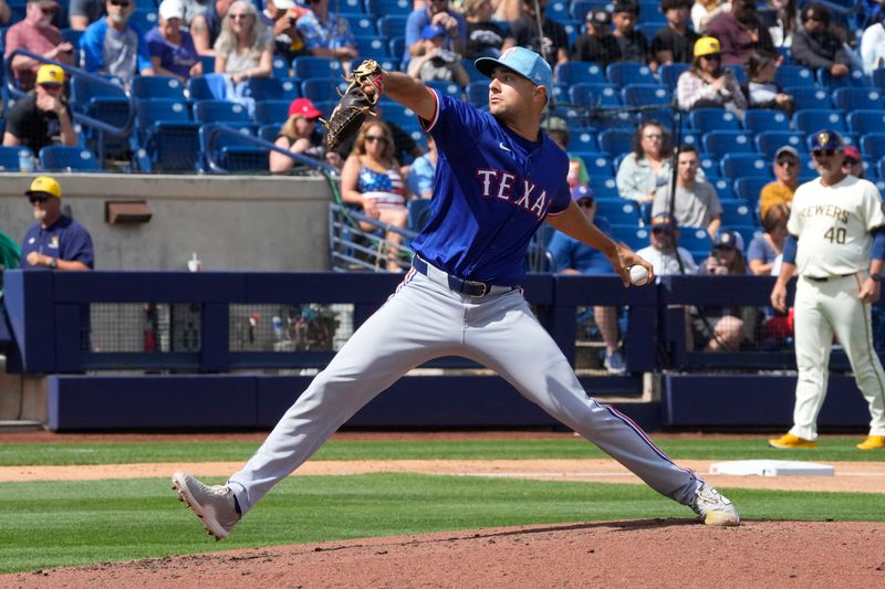 Mar 16, 2024; Phoenix, Arizona, USA; Texas Rangers relief pitcher Brock Burke (46) throws against the Milwaukee Brewers in the third inning at American Family Fields of Phoenix. Mandatory Credit: Rick Scuteri-USA TODAY Sports