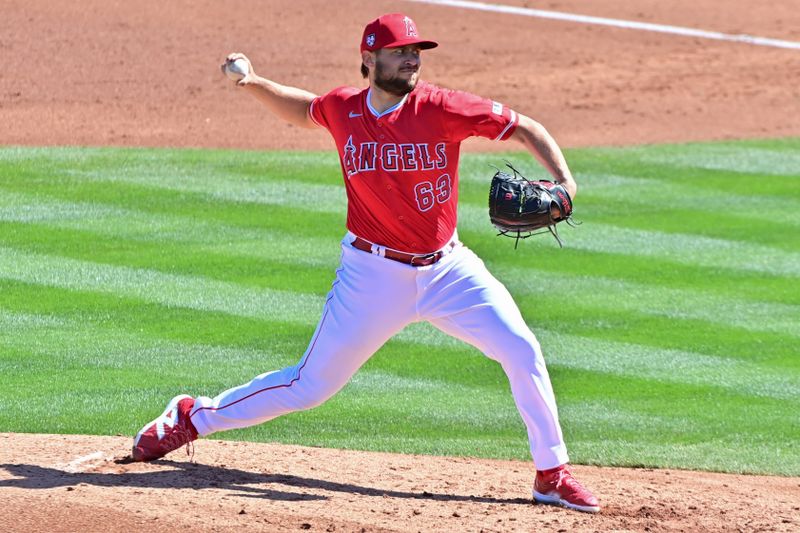 Feb 29, 2024; Tempe, Arizona, USA;  Los Angeles Angels starting pitcher Chase Silseth (63) throws in the third inning against the Cleveland Guardians during a spring training game at Tempe Diablo Stadium. Mandatory Credit: Matt Kartozian-USA TODAY Sports