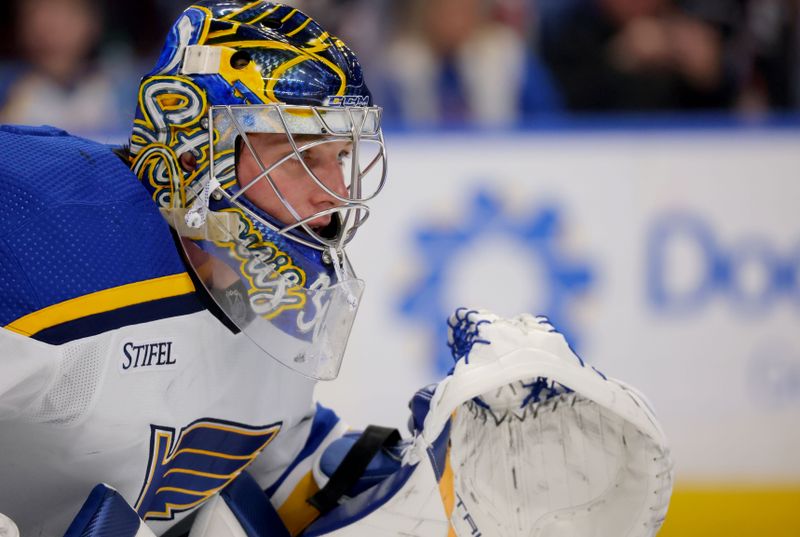 Feb 10, 2024; Buffalo, New York, USA;  St. Louis Blues goaltender Joel Hofer (30) looks to make a save during the second period against the Buffalo Sabres at KeyBank Center. Mandatory Credit: Timothy T. Ludwig-USA TODAY Sports