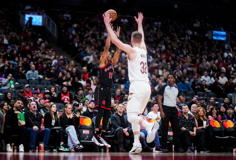 TORONTO, ON - FEBRUARY 10: Bruce Brown #11 of the Toronto Raptors shoots against the Cleveland Cavaliers during the second half of their basketball game at the Scotiabank Arena on February 10, 2024 in Toronto, Ontario, Canada. NOTE TO USER: User expressly acknowledges and agrees that, by downloading and/or using this Photograph, user is consenting to the terms and conditions of the Getty Images License Agreement. (Photo by Mark Blinch/Getty Images)