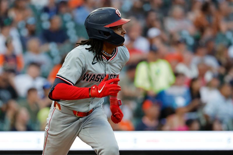 Jun 12, 2024; Detroit, Michigan, USA;  Washington Nationals shortstop CJ Abrams (5) hits a RBI double in the fifth inning against the Detroit Tigers at Comerica Park. Mandatory Credit: Rick Osentoski-USA TODAY Sports