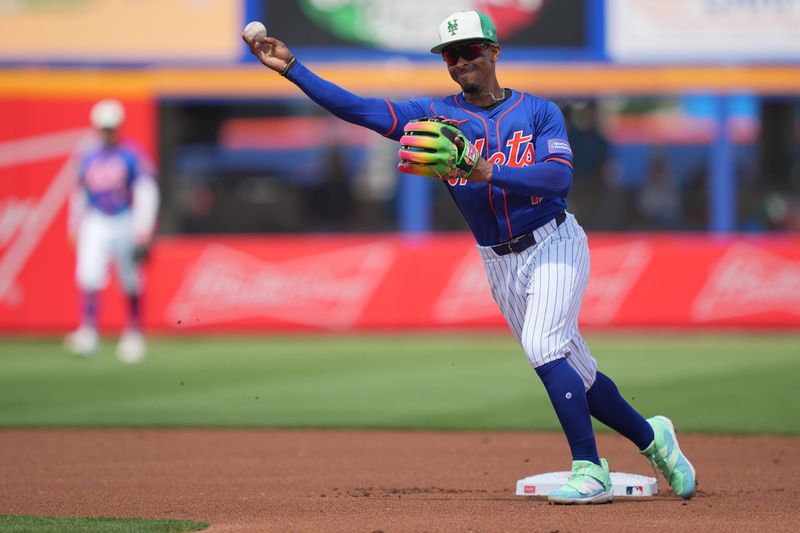 Mar 17, 2024; Port St. Lucie, Florida, USA;  New York Mets shortstop Francisco Lindor (12) completes a double play in the first inning against the Miami Marlins at Clover Park. Mandatory Credit: Jim Rassol-USA TODAY Sports