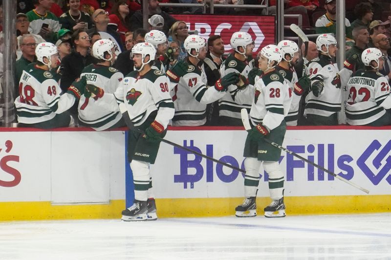 Oct 4, 2024; Chicago, Illinois, USA; Minnesota Wild center Marcus Johansson (90) celebrates his goal against the Chicago Blackhawks during the third period at United Center. Mandatory Credit: David Banks-Imagn Images