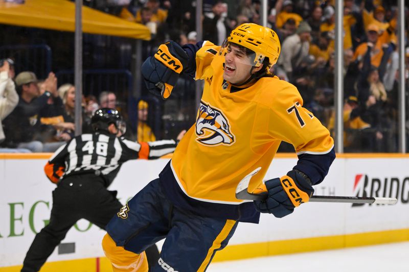 Oct 28, 2025; Nashville, Tennessee, USA;  Nashville Predators right wing Luke Evangelista (77) celebrates his goal against the Tampa Bay Lightning during the third period at Bridgestone Arena. Mandatory Credit: Steve Roberts-Imagn Images