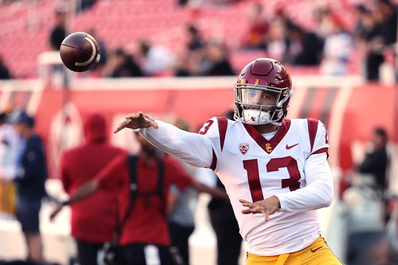 Oct 15, 2022; Salt Lake City, Utah, USA; USC Trojans quarterback Caleb Williams (13) warms up prior to a game against the Utah Utes at Rice-Eccles Stadium. Mandatory Credit: Rob Gray-USA TODAY Sports