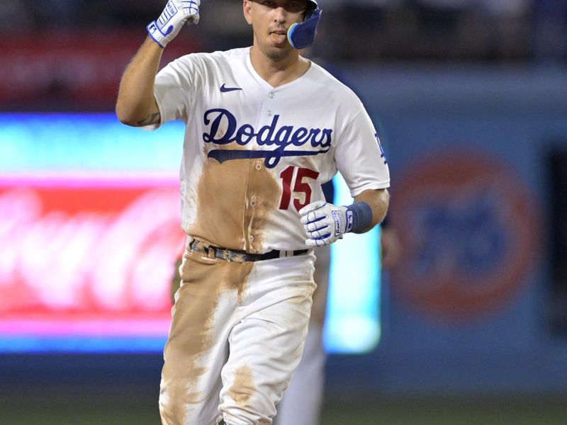 Aug 17, 2023; Los Angeles, California, USA;  Los Angeles Dodgers catcher Austin Barnes (15) rounds the bases after hitting a solo home run in the eighth inning against the Milwaukee Brewers at Dodger Stadium. Mandatory Credit: Jayne Kamin-Oncea-USA TODAY Sports