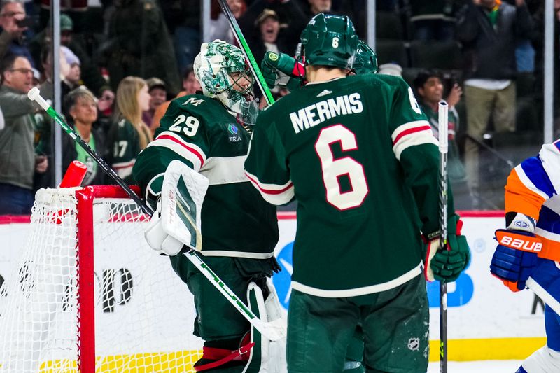 Jan 15, 2024; Saint Paul, Minnesota, USA; Minnesota Wild goaltender Marc-Andre Fleury (29) celebrates following the game where he passed former goalie Patrick Roy on the All-Time Wins list against the New York Islanders at Xcel Energy Center. Mandatory Credit: Brace Hemmelgarn-USA TODAY Sports