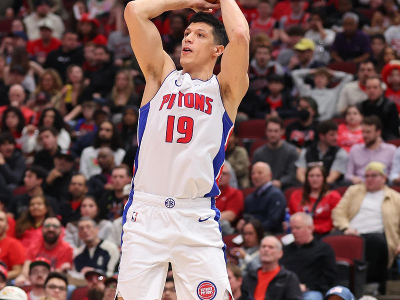 CHICAGO, ILLINOIS - FEBRUARY 27: Simone Fontecchio #19 of the Detroit Pistons shoots a jumper against the Chicago Bulls during the second half at the United Center on February 27, 2024 in Chicago, Illinois. NOTE TO USER: User expressly acknowledges and agrees that, by downloading and or using this photograph, User is consenting to the terms and conditions of the Getty Images License Agreement. (Photo by Michael Reaves/Getty Images)