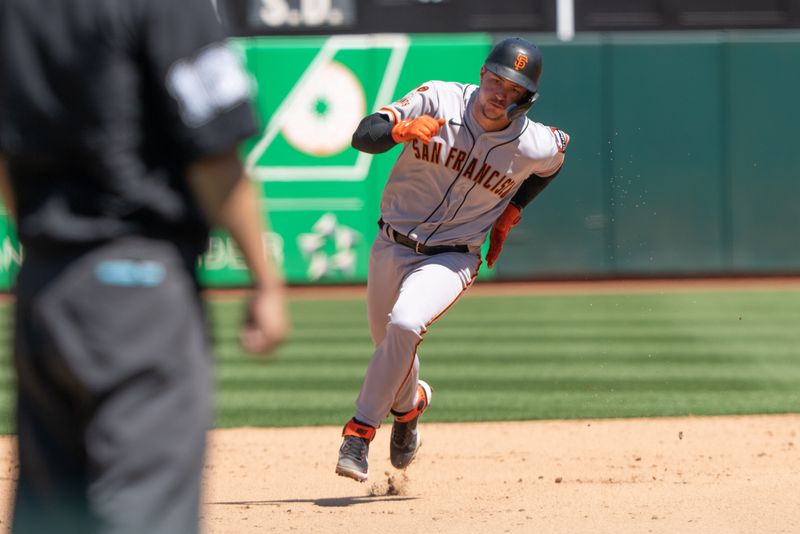 Aug 6, 2023; Oakland, California, USA;  San Francisco Giants catcher Patrick Bailey (14) runs during the fifth inning against the Oakland Athletics at Oakland-Alameda County Coliseum. Mandatory Credit: Stan Szeto-USA TODAY Sports