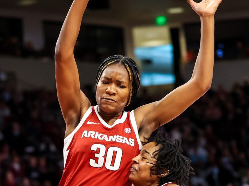 Jan 22, 2023; Columbia, South Carolina, USA; South Carolina Gamecocks guard Kierra Fletcher (41) drives into Arkansas Razorbacks forward Maryam Dauda (30) in the first half at Colonial Life Arena. Mandatory Credit: Jeff Blake-USA TODAY Sports