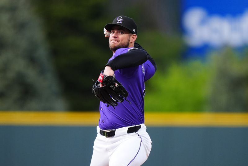 May 8, 2024; Denver, Colorado, USA; Colorado Rockies starting pitcher Peter Lambert (20) delivers a pitch in the first inning against the San Francisco Giants at Coors Field. Mandatory Credit: Ron Chenoy-USA TODAY Sports