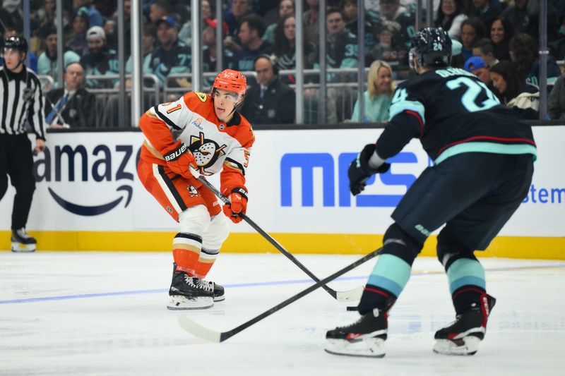 Oct 9, 2025; Seattle, Washington, USA; Anaheim Ducks defenseman Olen Zellweger (51) advances the puck against the Seattle Kraken during the third period at Climate Pledge Arena. Mandatory Credit: Steven Bisig-Imagn Images