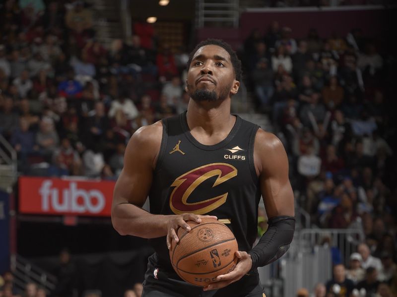 CLEVELAND, OH - November 15: Donovan Mitchell #45 of the Cleveland Cavaliers shoots a free throw during the game against the Chicago Bulls during the Emirates NBA Cup game on November 15, 2024 at Rocket Mortgage FieldHouse in Cleveland, Ohio. NOTE TO USER: User expressly acknowledges and agrees that, by downloading and/or using this Photograph, user is consenting to the terms and conditions of the Getty Images License Agreement. Mandatory Copyright Notice: Copyright 2024 NBAE (Photo by David Liam Kyle/NBAE via Getty Images)