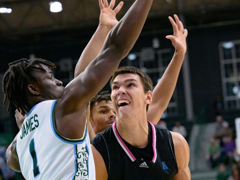 Jan 11, 2024; New Orleans, Louisiana, USA; Florida Atlantic Owls center Vladislav Goldin (50) looks to shoot around Tulane Green Wave guard Sion James (1) during the first half at Avron B. Fogelman Arena in Devlin Fieldhouse. Mandatory Credit: Matthew Hinton-USA TODAY Sports