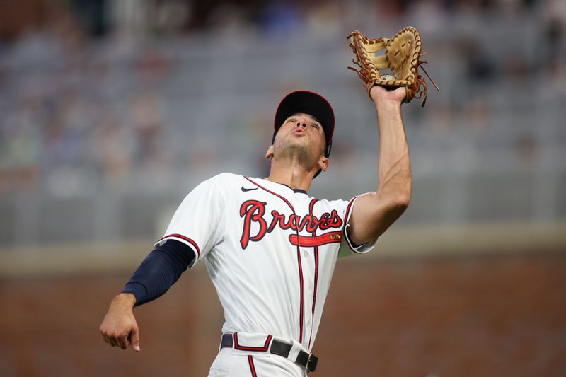 Apr 11, 2023; Atlanta, Georgia, USA; Atlanta Braves first baseman Matt Olson (28) catches a fly ball against the Cincinnati Reds in the fifth inning at Truist Park. Mandatory Credit: Brett Davis-USA TODAY Sports
