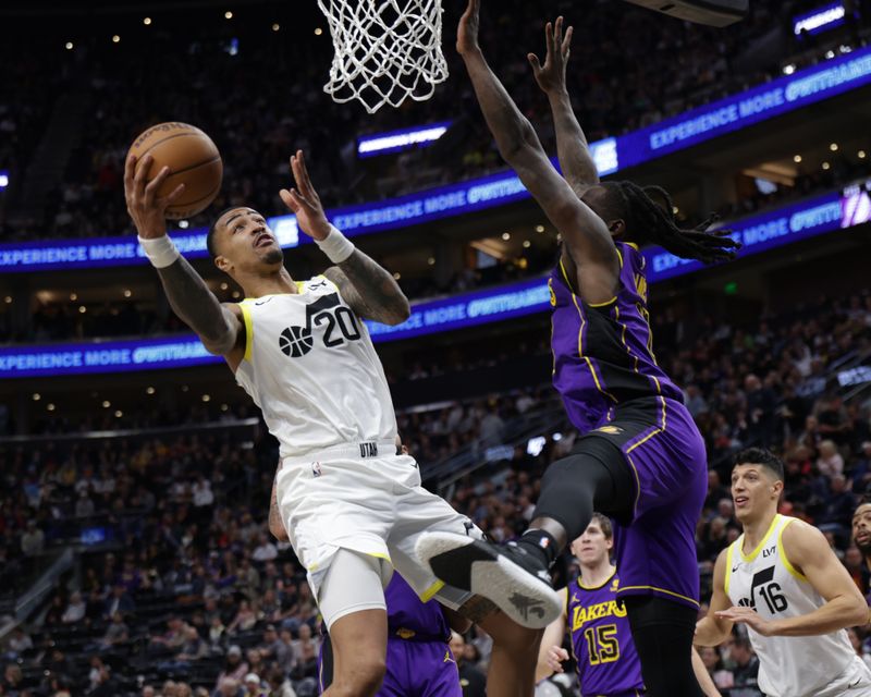 SALT LAKE CITY, UT - JANUARY 13: John Collins #20 of the Utah Jazz drives to the basket during the game against the Los Angeles Lakers on January 13, 2024 at vivint.SmartHome Arena in Salt Lake City, Utah. NOTE TO USER: User expressly acknowledges and agrees that, by downloading and or using this Photograph, User is consenting to the terms and conditions of the Getty Images License Agreement. Mandatory Copyright Notice: Copyright 2024 NBAE (Photo by Chris Nicoll/NBAE via Getty Images)