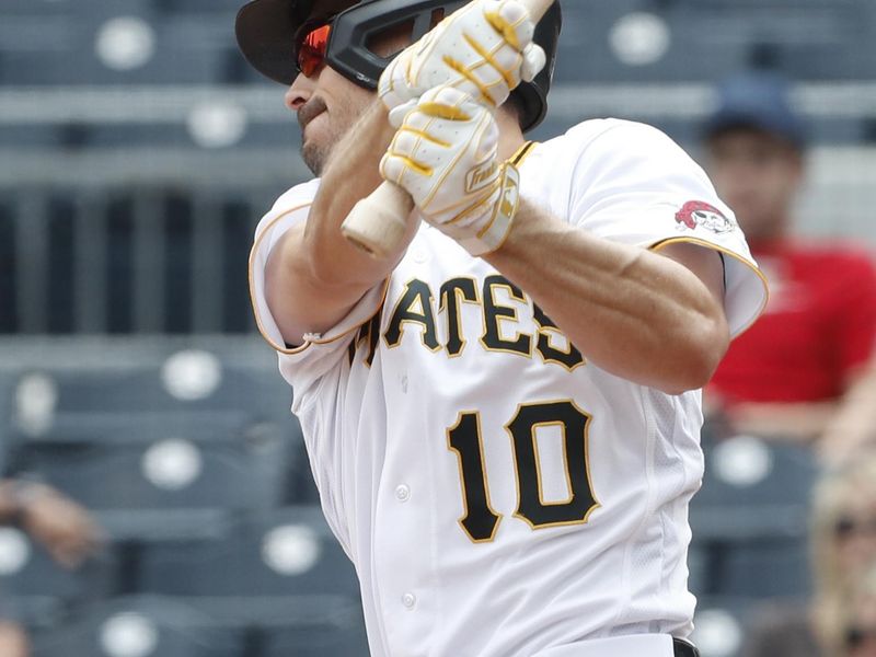 Jun 7, 2023; Pittsburgh, Pennsylvania, USA;  Pittsburgh Pirates left fielder Bryan Reynolds (10) hits an RBI single against the Oakland Athletics during the ninth inning at PNC Park. Oakland won 9-5. Mandatory Credit: Charles LeClaire-USA TODAY Sports