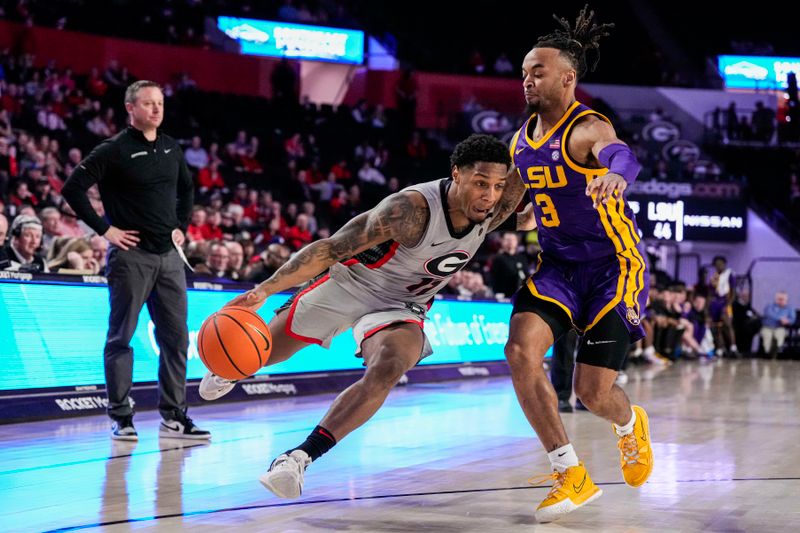 Feb 14, 2023; Athens, Georgia, USA; Georgia Bulldogs guard Justin Hill (11) dribbles against LSU Tigers guard Justice Hill (3) during the second half at Stegeman Coliseum. Mandatory Credit: Dale Zanine-USA TODAY Sports