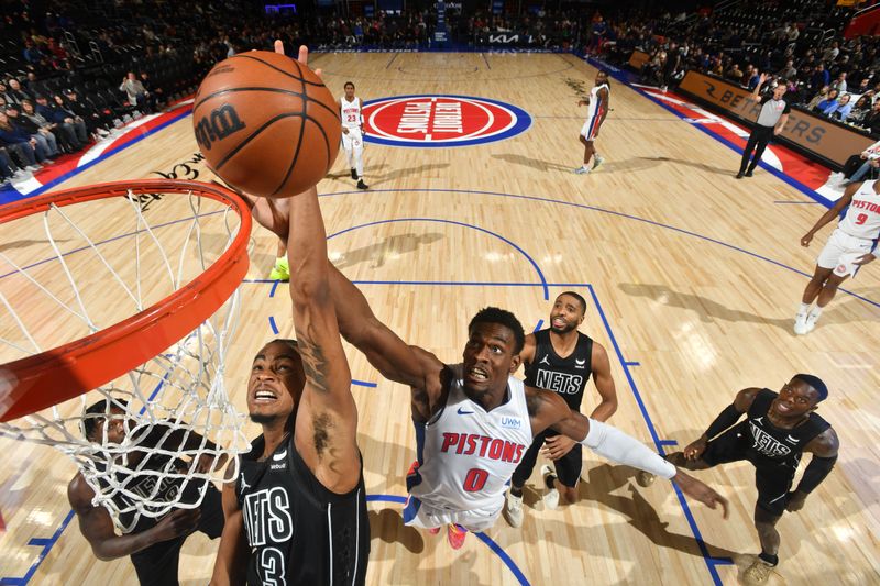 DETROIT, MI - MARCH 7: Nicolas Claxton #33 of the Brooklyn Nets grabs a rebound during the game against the Detroit Pistons on March 7, 2024 at Little Caesars Arena in Detroit, Michigan. NOTE TO USER: User expressly acknowledges and agrees that, by downloading and/or using this photograph, User is consenting to the terms and conditions of the Getty Images License Agreement. Mandatory Copyright Notice: Copyright 2024 NBAE (Photo by Chris Schwegler/NBAE via Getty Images)