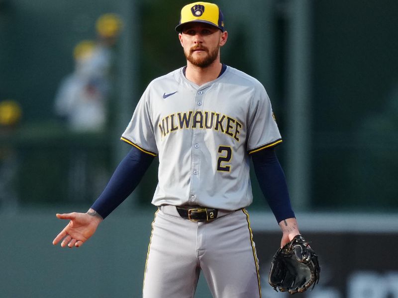 Jul 1, 2024; Denver, Colorado, USA; Milwaukee Brewers second base Brice Turang (2) reacts to a pitch clock violation called in the first inning against the Colorado Rockies at Coors Field. Mandatory Credit: Ron Chenoy-USA TODAY Sports