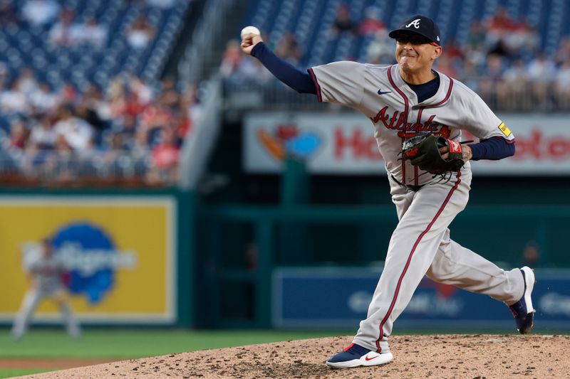 Sep 10, 2024; Washington, District of Columbia, USA; Atlanta Braves pitcher Jesse Chavez (60) pitches against the Washington Nationals during the second inning at Nationals Park. Mandatory Credit: Geoff Burke-Imagn Images