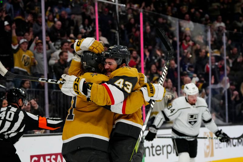 Dec 28, 2023; Las Vegas, Nevada, USA; Vegas Golden Knights center William Karlsson (71) celebrates with center Paul Cotter (43) after scoring a goal against the Los Angeles Kings during the second period at T-Mobile Arena. Mandatory Credit: Lucas Peltier-USA TODAY Sports