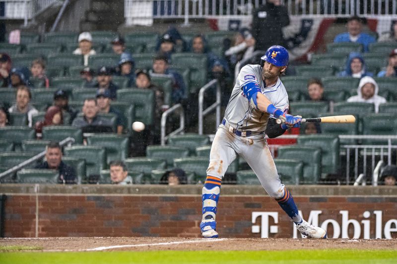 Apr 9, 2024; Cumberland, Georgia, USA; New York Mets second baseman Jeff McNeil (1) grounds out to against Atlanta Braves during the fourth inning at Truist Park. Mandatory Credit: Jordan Godfree-USA TODAY Sports