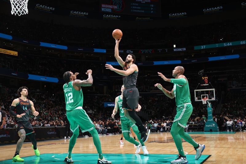 WASHINGTON, DC -? MARCH 17: Anthony Gill #16 of the Washington Wizards drives to the basket during the game against the Boston Celtics on March 17, 2024 at Capital One Arena in Washington, DC. NOTE TO USER: User expressly acknowledges and agrees that, by downloading and or using this Photograph, user is consenting to the terms and conditions of the Getty Images License Agreement. Mandatory Copyright Notice: Copyright 2024 NBAE (Photo by Stephen Gosling/NBAE via Getty Images)