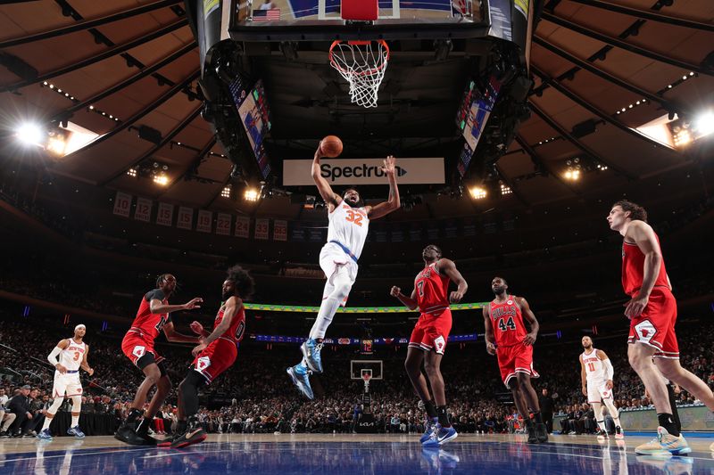 NEW YORK, NY - NOVEMBER 13: Karl-Anthony Towns #32 of the New York Knicks drives to the basket during the game against the Chicago Bulls on November 13, 2024 at Madison Square Garden in New York City, New York.  NOTE TO USER: User expressly acknowledges and agrees that, by downloading and or using this photograph, User is consenting to the terms and conditions of the Getty Images License Agreement. Mandatory Copyright Notice: Copyright 2024 NBAE  (Photo by Joe Murphy/NBAE via Getty Images)