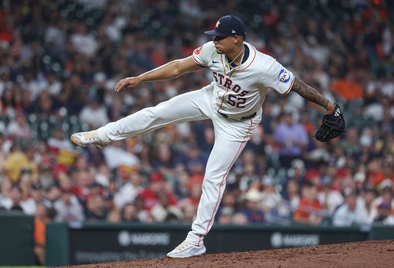 May 21, 2024; Houston, Texas, USA; Houston Astros relief pitcher Bryan Abreu (52) delivers a pitch during the seventh inning against the Los Angeles Angels at Minute Maid Park. Mandatory Credit: Troy Taormina-USA TODAY Sports