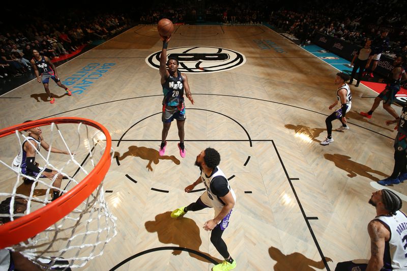 BROOKLYN, NY - APRIL 7: Day'Ron Sharpe #20 of the Brooklyn Nets shoots the ball during the game against the Sacramento Kings on April 7, 2024 at Barclays Center in Brooklyn, New York. NOTE TO USER: User expressly acknowledges and agrees that, by downloading and or using this Photograph, user is consenting to the terms and conditions of the Getty Images License Agreement. Mandatory Copyright Notice: Copyright 2024 NBAE (Photo by Nathaniel S. Butler/NBAE via Getty Images)