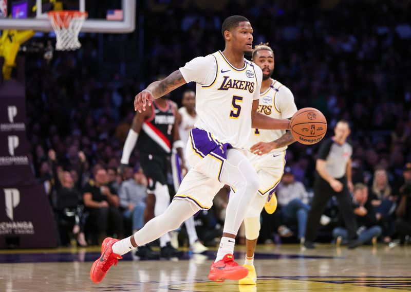 LOS ANGELES, CALIFORNIA - DECEMBER 08: Cam Reddish #5 of the Los Angeles Lakers handles the ball in the second half against the Portland Trail Blazers at Crypto.com Arena on December 08, 2024 in Los Angeles, California. NOTE TO USER: User expressly acknowledges and agrees that, by downloading and or using this Photograph, user is consenting to the terms and conditions of the Getty Images License Agreement. (Photo by Meg Oliphant/Getty Images)