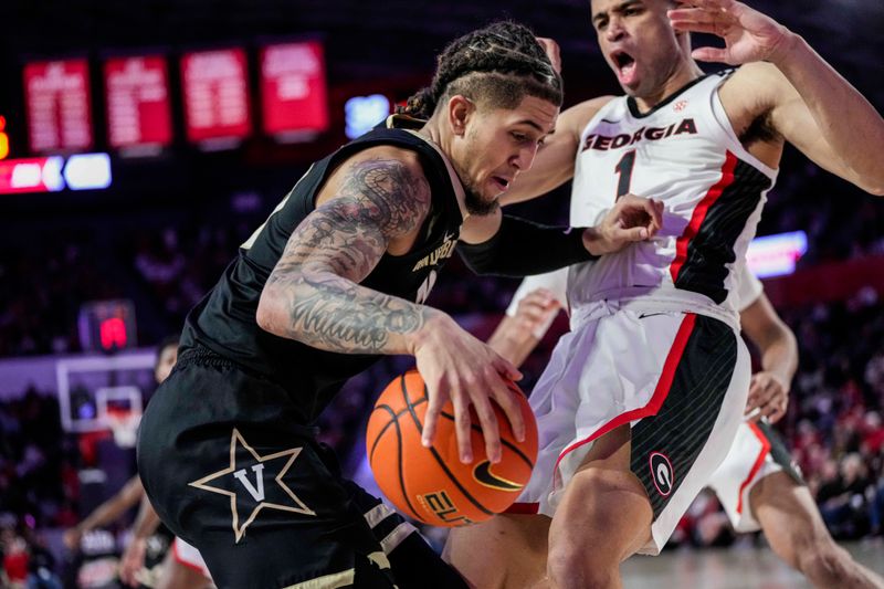 Jan 21, 2023; Athens, Georgia, USA; Vanderbilt Commodores forward Myles Stute (10) is called for a charging foul on Georgia Bulldogs guard Jabri Abdur-Rahim (1) during the first half at Stegeman Coliseum. Mandatory Credit: Dale Zanine-USA TODAY Sports