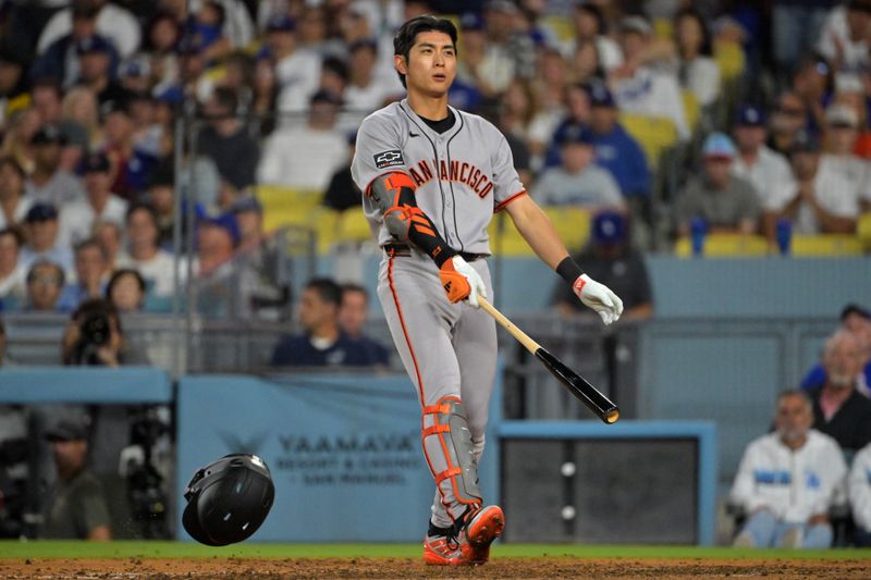 Sep 20, 2025; Los Angeles, California, USA;  San Francisco Giants center fielder Jung Hoo Lee (51) swings at a strike off Los Angeles Dodgers starting pitcher Tyler Glasnow (31) in the fifth inning at Dodger Stadium. Mandatory Credit: Jayne Kamin-Oncea-Imagn Images