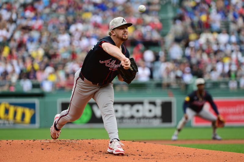 May 18, 2025; Boston, Massachusetts, USA;  Atlanta Braves starting pitcher Spencer Schwellenbach (56) pitches during the first inning against the Boston Red Sox at Fenway Park. Mandatory Credit: Bob DeChiara-Imagn Images
