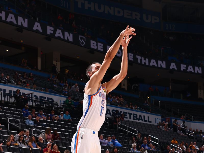 OKLAHOMA CITY, OK - OCTOBER 9: Aleksej Pokusevski #17 of the Oklahoma City Thunder shoots the ball during the game against Maccabi Ra'anana  on October 9, 2022 at Paycom Arena in Oklahoma City, Oklahoma. NOTE TO USER: User expressly acknowledges and agrees that, by downloading and or using this photograph, User is consenting to the terms and conditions of the Getty Images License Agreement. Mandatory Copyright Notice: Copyright 2022 NBAE (Photo by Zach Beeker/NBAE via Getty Images)