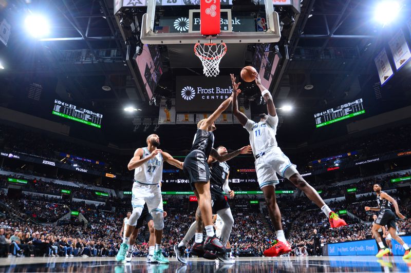 SAN ANTONIO, TX - JANUARY 27: Naz Reid #11 of the Minnesota Timberwolves drives to the basket during the game against the San Antonio Spurs on January 27, 2024 at the Frost Bank Center in San Antonio, Texas. NOTE TO USER: User expressly acknowledges and agrees that, by downloading and or using this photograph, user is consenting to the terms and conditions of the Getty Images License Agreement. Mandatory Copyright Notice: Copyright 2024 NBAE (Photos by Michael Gonzales/NBAE via Getty Images)